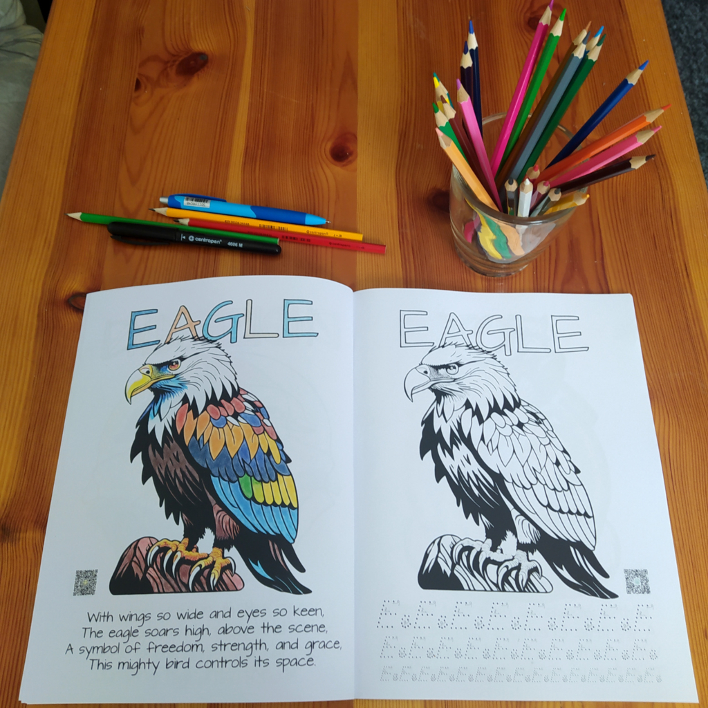 Opened Animal Alphabet coloring book on the table.